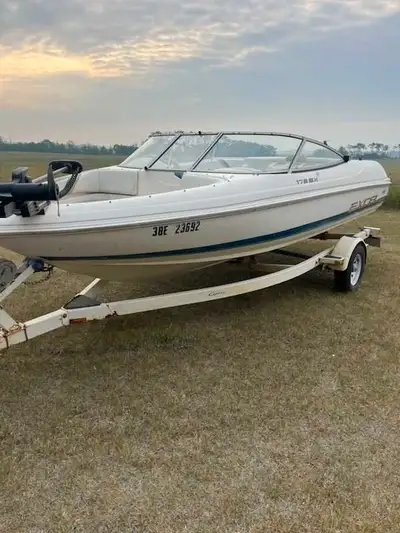 1997 open bow ski/fishing boat. 17.5ft. Has bimini, fish finder, cb radio, trolling motor, trailer,...