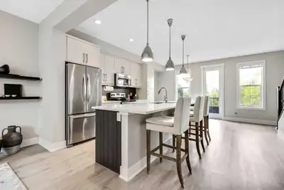Welcome to your elegant new home in Quarry Park! Located in a well established community, this townh...