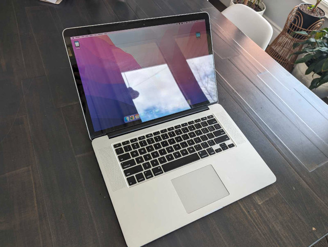 Macbook Pro 15 inch + New Battery + Storage expansion in Laptops in Mississauga / Peel Region