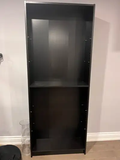 Billy bookcase 80x28x202 black brown, plus top extension. As new. $60.