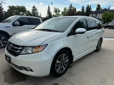2016 Honda Odyssey Touring with 115,000 km We performed the 100,000 maintenance which included the t...