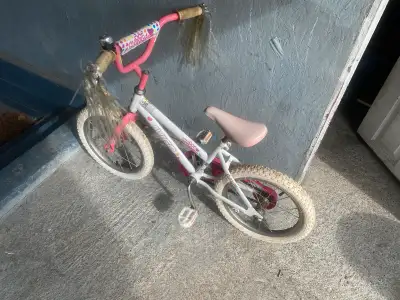 Girls bike Training wheels are off but we have them to provide with the bike. Lightly used. Single s...
