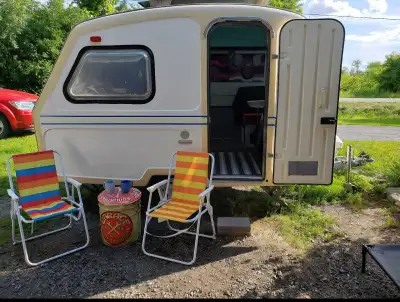 Lightweight rare vintage camper. Double bed, table can turn into small bed. Sink and propane stove r...