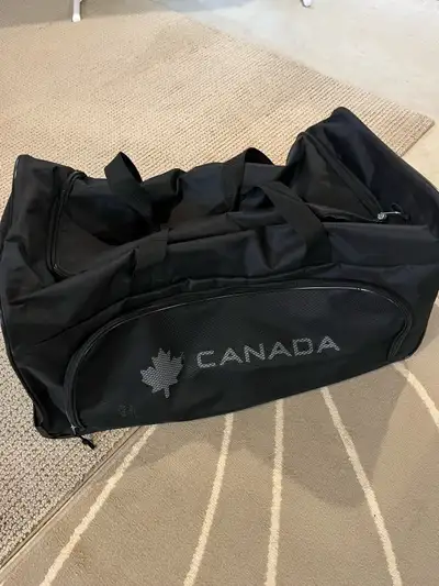 Black roller duffel bag, brand new. Intended to be gifts. Two available. $25 each. For pick up in Co...