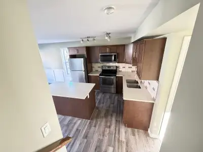 Premium townhouse available for rent immediately. Fully finished basement with infloor heat and wet...