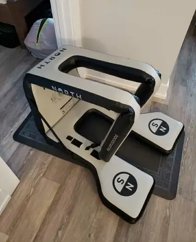 New condition inflatable North Dockstarter for learning pump foiling off a dock. No damages or repai...