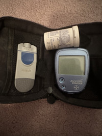 Ascensia Contour Glucometer, test strips and lancing device
