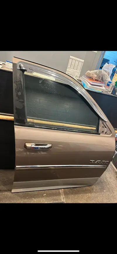 2009 and up dodge ram front p/s door in mint condation asking $700 . Please call or text 613-853-432...