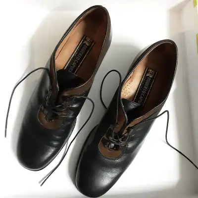 Made in Italy. Size 8, width 4a (slim). Low rise heel, arch support, Spaghetti String Laces. Dark Ch...