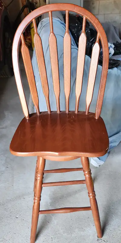 Solid wooden swivel bar stools with oak finish. $100, View more