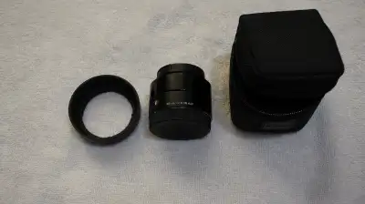 Very sharp lens. works like new with no issues. Comes with case, lens hood and both front and rear l...