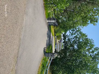 5 Bedrooms and 3 Bathrooms house on an acarage, very near Chestermere town. Lots of parking specs, 2...