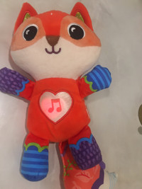 Musical fox toy, new condition