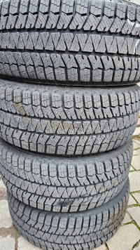 215/55/17 Bridgestone winter tires  95% tread
