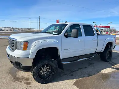 2012 duramax, crew cab short box, slt with sun roof, 6 inch lift, deleted with bully dog programmer,...