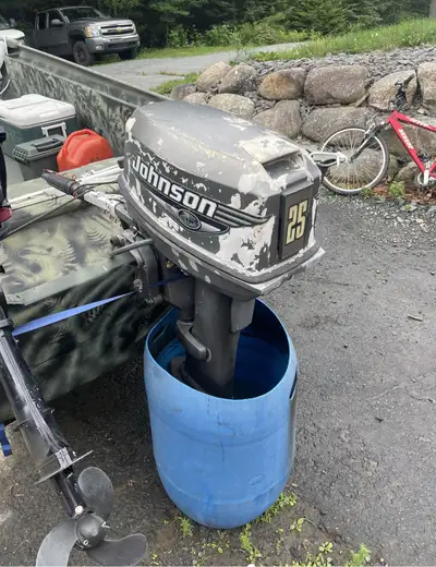 25 Johnson outboard electric start long shaft tiller handle worked good last time I used it 1200 obo...