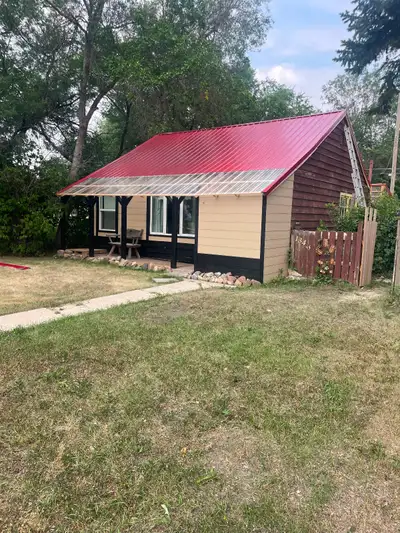 1 1/2 blocks from Pasqua hospital. Small rustic cottage. With garage send me your phone number for s...