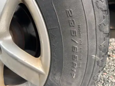 Selling 4 - 235/65/17 winter tires TIRES ONLY< NO RIMS Tires are used but still have 2-3 years worth...