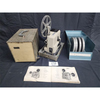 Vintage Film Projector and Film Cans