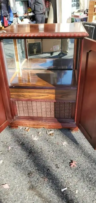 ROSEWOOD 2 DOOR CABINET ON WHEELS., View more