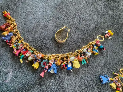 Disney 32 character bracelet , and necklace , unfortunately only one earring. EBay and esty are appr...