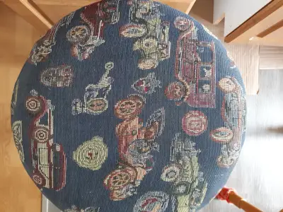 Stool with cushioned seat, View more