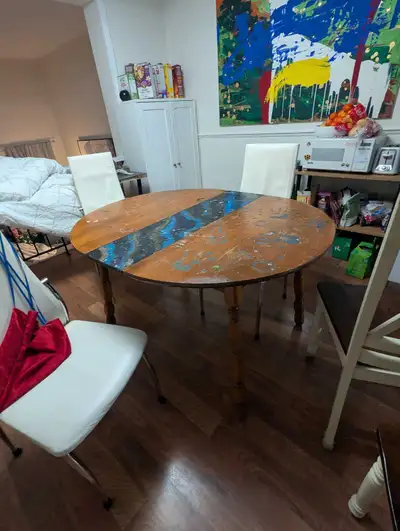 Free dining table. Additional leaves (leafs?). Great for arts and crafts or in the basement for puzz...