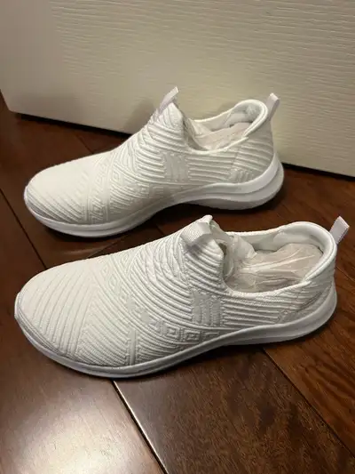 Sketchers white shoes , View more
