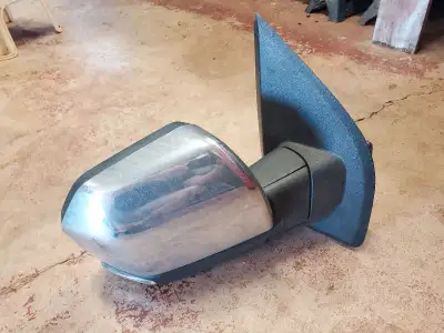 Passenger side mirror assembly for 15-20 Ford F150. Power adjustment and defrost. Located in Kensing...