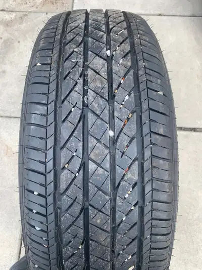 For sale are Bridgestone Dueler H/P sports AS tires used for less than a season, then stored in like...