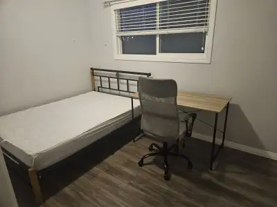 A private room for rent in Calgary, walk to Saddletowne C-train.
