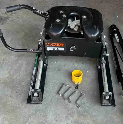 Curt fifth wheel hitch used only a handful of times. Dont need it anymore trailer is sold. Comes wit...