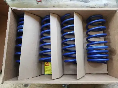 Upgrade your vehicle's handling and aesthetic with these high-quality H&R lowering springs designed...