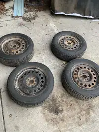 4 nitto snow tires on rims