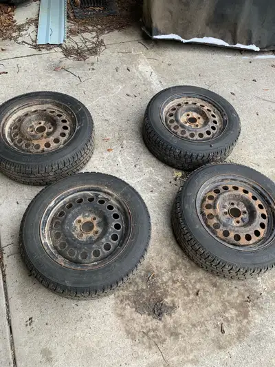 Selling 4 nitto snow tires on rims bolt pattern 4x100. No leaks or plugs, they came off a Honda insi...