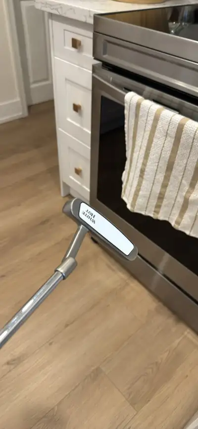 Good condition Odyssey Putter. Right hand. 34 inch with head cover.
