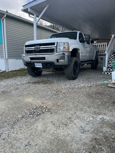 Check out this fantastic 2011 Chevrolet Silverado 2500HD LTZ Crew Cab, a robust four-door truck powe...