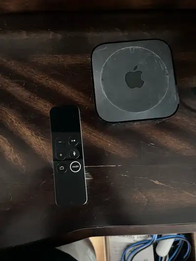 I'm selling a used Apple TV that streams video in high definition, offering access to various stream...