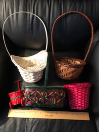 Five small woven baskets