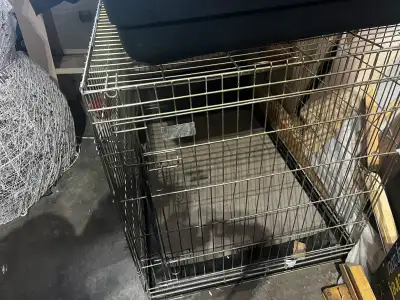 Extra large dog kennel. 30”W x 48D x 32” H.