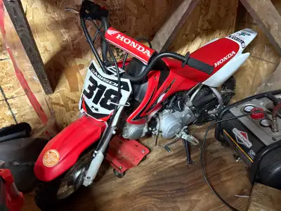 - 2021 Honda CRF50, needs nothing, works great, great tires, bought for my son to learn but he only...