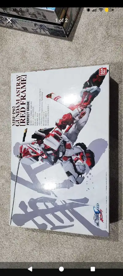 Original Red Astray released in first wave of Perfect Grades in Canada. Bought at Fan Expo a while b...