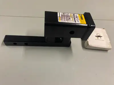 Selling a Maxhaul 1 1/4" to 2" hitch adapter which provides a 4" rise or 3 3/8" drop. It is rated fo...