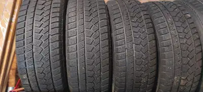 Four winter tires on steel wheels from 2013 Kia Rio SX. 195/55/16