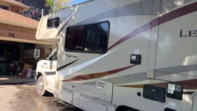 This pre-owned Coachmen Leprechaun is ready for your next adventure with reliable performance and a...