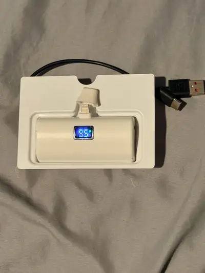 White Iphone Portable charger , View more