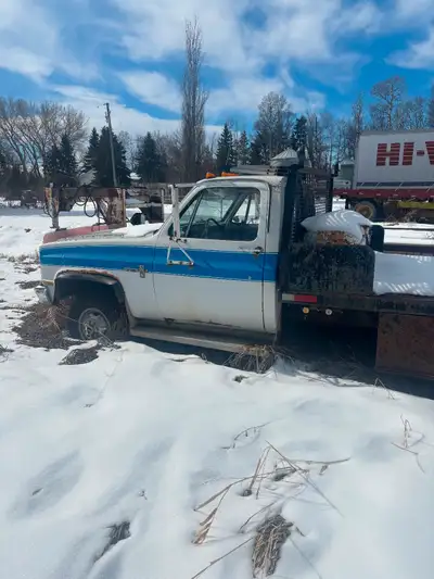 1984 Chev 1 ton Dually 454 engine on propane 4 spd automatic 4x4 manual hubs With a 12 foot hydrauli...
