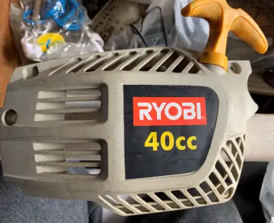 Ryobi item Gas Chainsaw pully & cord ,,, $10 ..............donnie................,,,,,,,,,,,,,,,,,,...