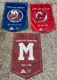 Stanley Cup champions banners - Islanders, Devils, Maroons