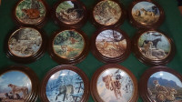 12 Collectible plates plus  mounting rings Wild Cats new price